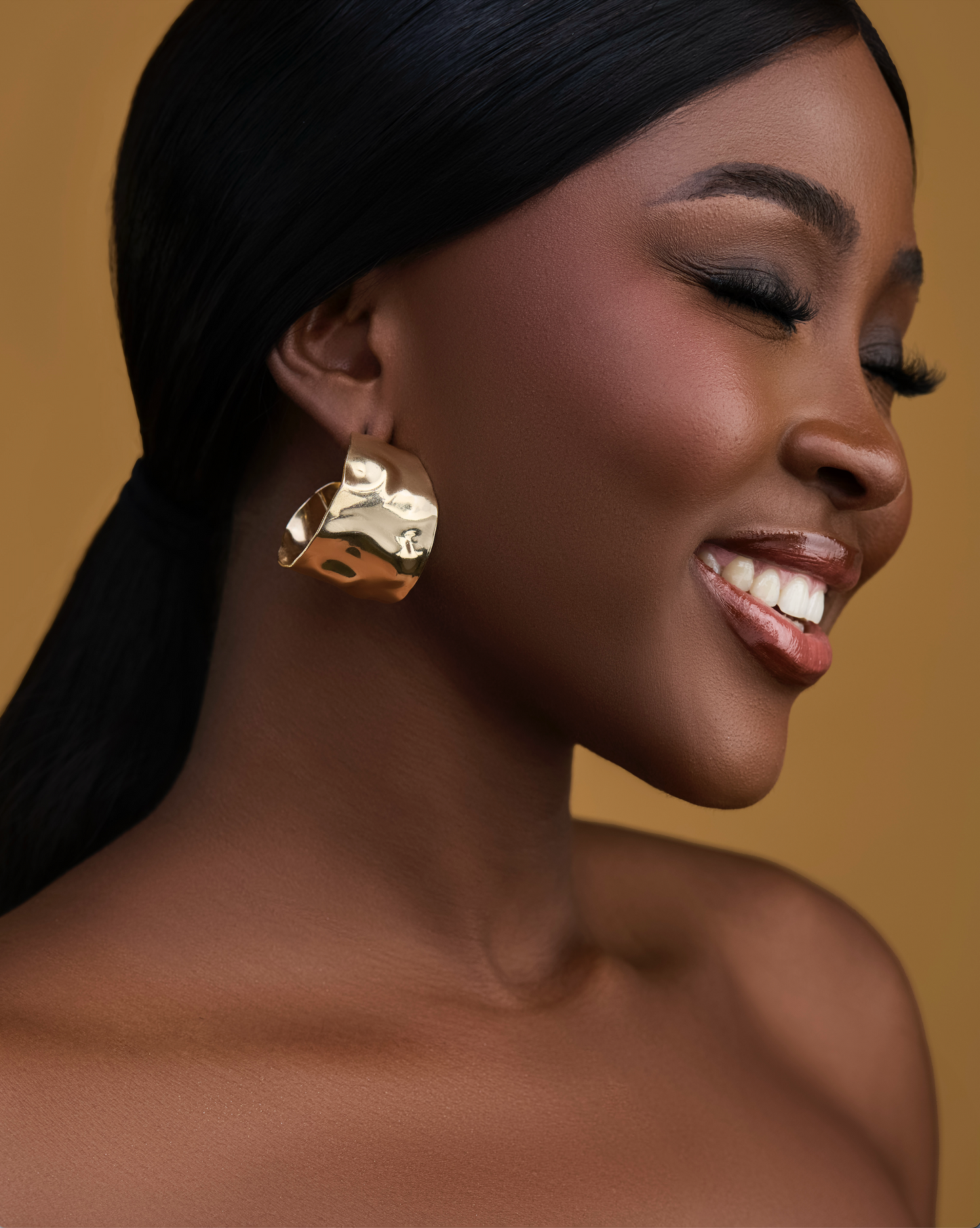 Model wearing Ifeanyi Hoops from House of Adin